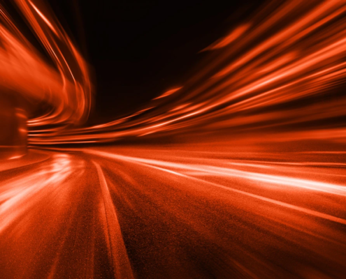 Energie Dynamische rote Lichtspuren symbolisieren Energie, Dynamik und kontinuierliche Entwicklung.
